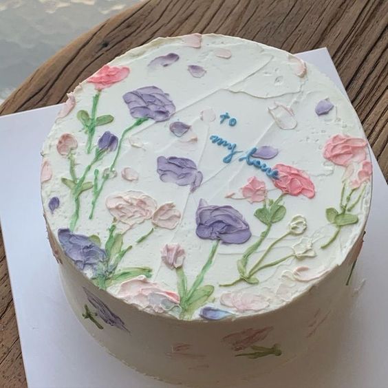 Bánh sinh nhật tròn vẽ vườn hoa